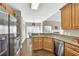 Bright kitchen view, which leads to the dining area, with stainless appliances at 4198 Haynes Mill Nw Ct, Kennesaw, GA 30144