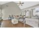Comfortable living room features vaulted ceilings, fireplace, and ample seating at 4198 Haynes Mill Nw Ct, Kennesaw, GA 30144