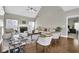 Bright living room features vaulted ceilings, a fireplace, and comfortable seating at 4198 Haynes Mill Nw Ct, Kennesaw, GA 30144