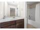 Bathroom with vanity, shower, and tub with modern fixtures and accessories at 3492 Maple Hill Rd, Lithonia, GA 30038