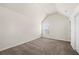 Cozy bedroom with neutral carpet, vaulted ceiling, and ample natural light at 3492 Maple Hill Rd, Lithonia, GA 30038