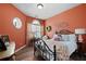 Inviting bedroom with stylish decor, round-top windows, and warm accents at 3832 Abbott Ln # 1, Powder Springs, GA 30127
