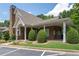 A handsome brick clubhouse with covered porch, mature trees, and convenient parking at 3832 Abbott Ln # 1, Powder Springs, GA 30127
