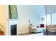 Bright living room with a fireplace, comfortable seating, and natural light at 3832 Abbott Ln # 1, Powder Springs, GA 30127