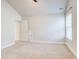 Bright bedroom featuring neutral walls, carpet, and closet space at 4450 Heatherwood Sw Dr, Atlanta, GA 30331