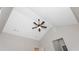 A modern ceiling fan with light fixture adorns the high vaulted ceiling in this home at 30 Sportsman Path, Dallas, GA 30157