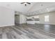 A spacious open-concept living space merges a living room and kitchen under a vaulted ceiling at 30 Sportsman Path, Dallas, GA 30157