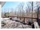 A spacious back deck provides an ideal spot for relaxation and enjoying the surrounding wooded scenery at 3405 Lake Valley Way, Douglasville, GA 30135