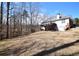 Expansive backyard featuring a walkout basement and deck, perfect for outdoor enjoyment at 3405 Lake Valley Way, Douglasville, GA 30135