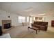 Open basement living area features a stone fireplace, and a large space for entertaining at 3405 Lake Valley Way, Douglasville, GA 30135