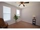 Bright and airy bedroom with neutral carpet, a ceiling fan, and large windows at 3405 Lake Valley Way, Douglasville, GA 30135