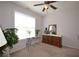 Light-filled bedroom featuring plants, dresser, and ample space for relaxation at 3405 Lake Valley Way, Douglasville, GA 30135