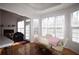 Cozy dining area with natural light, hardwood floors, and seating for four at 3405 Lake Valley Way, Douglasville, GA 30135
