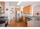 Well-equipped kitchen with stainless steel appliances, hardwood floors, and ample counter space at 3405 Lake Valley Way, Douglasville, GA 30135