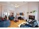 Bright and airy living room with hardwood floors, a fireplace, and ample seating at 3405 Lake Valley Way, Douglasville, GA 30135