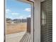 Through the doors, enjoy views of the neighborhood pond, a neighborhood amenity at 3545 Bexton Dr, Duluth, GA 30097
