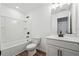 Bathroom featuring shower and tub combination, toilet and vanity with sink at 3545 Bexton Dr, Duluth, GA 30097