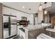 Modern kitchen with stainless steel appliances, white cabinets, and granite countertops at 361 17Th Nw St # 807, Atlanta, GA 30363