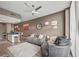 Open-concept living room with a view of the kitchen and comfortable seating arrangements at 361 17Th Nw St # 807, Atlanta, GA 30363