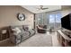 Bright living room features large windows, comfortable seating, and modern decor at 361 17Th Nw St # 807, Atlanta, GA 30363