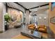 A stylish building lobby with modern furniture and interesting art pieces at 361 17Th Nw St # 807, Atlanta, GA 30363
