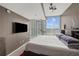 This modern main bedroom features a large window offering great natural light at 361 17Th Nw St # 807, Atlanta, GA 30363