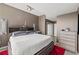 Spacious main bedroom with modern decor, including a king-size bed and storage at 361 17Th Nw St # 807, Atlanta, GA 30363