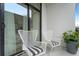 Cozy balcony features comfortable seating and modern design, offering an inviting outdoor space for relaxation at 567 Ponce De Leon Ne Ave # 510, Atlanta, GA 30308