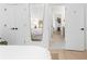 Bedroom with hardwood floors and view to adjoining room at 567 Ponce De Leon Ne Ave # 510, Atlanta, GA 30308