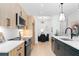 Modern kitchen featuring stainless steel appliances, a center island, and seamless flow to the dining area at 567 Ponce De Leon Ne Ave # 510, Atlanta, GA 30308