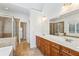 Bathroom with dual sinks, shower, and separate soaking tub at 2428 Crescent Park Ct, Atlanta, GA 30339