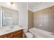 Bathroom with a vanity, and tiled shower-tub combo at 2428 Crescent Park Ct, Atlanta, GA 30339