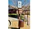 Community dog station equipped with pet waste bags and disposal bin at 2428 Crescent Park Ct, Atlanta, GA 30339