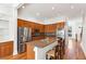 Modern kitchen with stainless steel appliances, granite countertops, and a center island with seating at 2428 Crescent Park Ct, Atlanta, GA 30339