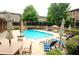 Enjoy the community pool and surrounding seating area in this inviting outdoor space at 2428 Crescent Park Ct, Atlanta, GA 30339
