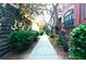 Sidewalk alongside well landscaped brick homes in a quiet community at 2428 Crescent Park Ct, Atlanta, GA 30339
