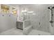 Bathroom featuring tiled walls and floors and a glass enclosed shower with a seat at 685 Stickley Oak Way, Woodstock, GA 30189