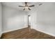 This bedroom offers hardwood floors, a ceiling fan and two doors providing both convenience and style at 685 Stickley Oak Way, Woodstock, GA 30189