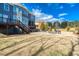 Expansive backyard showing a deck, patio area, and plenty of green space for outdoor activities at 1205 Trey Ct, Marietta, GA 30064