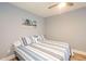 Cozy bedroom with a comfortable bed and nautical decor, perfect for relaxation at 1205 Trey Ct, Marietta, GA 30064