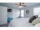 Bright bedroom featuring a ceiling fan, closet, and a comfortable bed at 1205 Trey Ct, Marietta, GA 30064