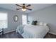 Bedroom featuring a bed, a window with blinds, and a ceiling fan at 1205 Trey Ct, Marietta, GA 30064