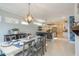 Dining room with a kitchen island in the background, perfect for casual meals and entertaining guests at 1205 Trey Ct, Marietta, GA 30064