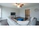 Living room featuring hardwood floors, a ceiling fan, and comfortable seating at 1205 Trey Ct, Marietta, GA 30064