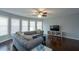 Living Room with hardwood floors, large windows, modern decor, and ceiling fan at 1205 Trey Ct, Marietta, GA 30064