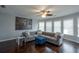 Living room with hardwood floors, a ceiling fan, and comfortable seating at 1205 Trey Ct, Marietta, GA 30064