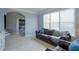 Cozy living room featuring a leather sofa, a window, and hardwood floors at 1205 Trey Ct, Marietta, GA 30064