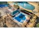 Aerial view of a community pool with a covered area and seating by the poolside at 1205 Trey Ct, Marietta, GA 30064