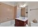 Cozy bathroom with a shower-tub, vanity with storage, and modern finishes at 1690 Mosaic Way, Smyrna, GA 30080