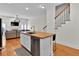 Bright kitchen island with butcher block countertop and stainless steel dishwasher at 1690 Mosaic Way, Smyrna, GA 30080